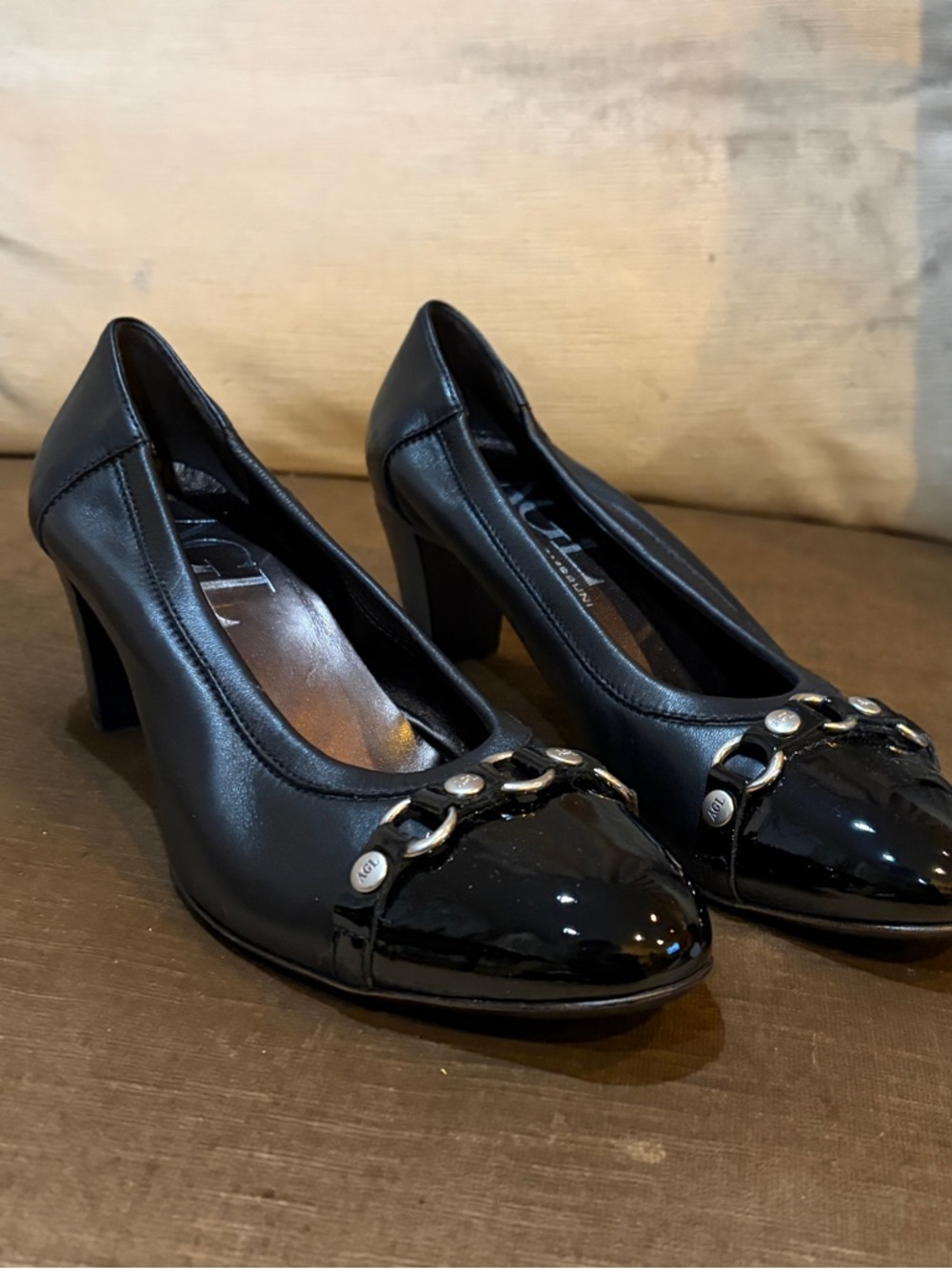Attilio Giusti Leombruni Black Mid-Heel Pumps with Chain Detail